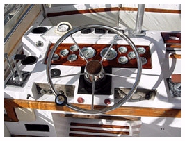 Playin' Hooky charters the helm