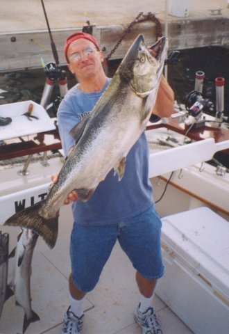 hooky_charter_man_with_large_coho.jpg