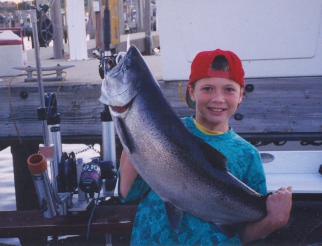 hooky_charter_young_man_big_fish.jpg