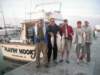group_on_dock_withfishbackofboat_small.jpg