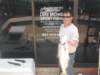 johnwith1fishbackdoor_small.jpg